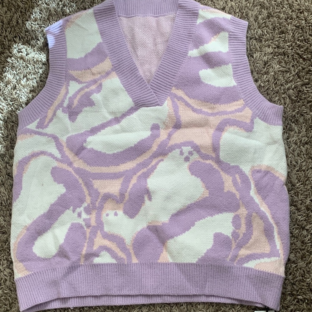 A vest Sweater suitable for fall, autumn and winter
